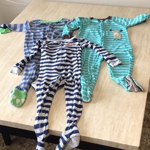 Lot of 3 Carters light footie pj sets.
